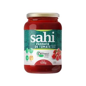 Pote-de-vidro-com-tampa-dourada-contendo-passata-de-tomate-da-marca-Sahi-rotulo-verde-com-destaque-para-certificacao-organica.